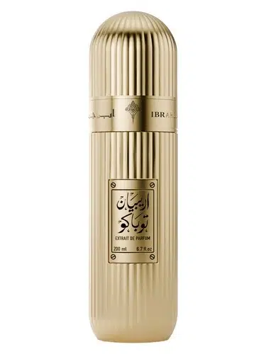 Le grand flacon doré Arabian Tobacco orné d'une calligraphie traditionnelle.